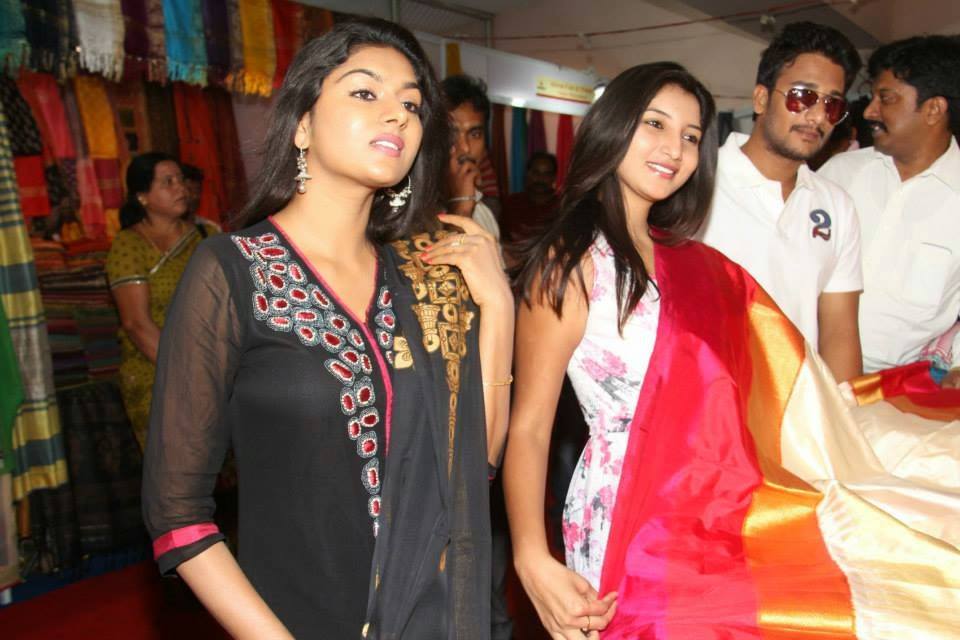 Actress Vinny & co-stars selecting dress material at Samprada.